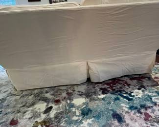 C55 - $1,200. Crate & Barrel Slip Covered Sofa. Measures 78.5" wide x 17.5" floor to seat x 30" deep. (Slipcover was just washed so excuse the wrinkles!) Includes an extra set of slip covers. Very comfortable and in very good condition. Non smoking home - No pets.