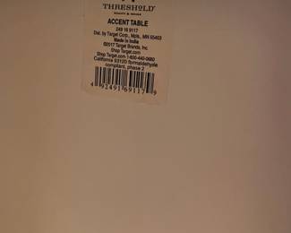 C104 - $45. Target "Accent Table". Measures 46" wide x 12" deep x 18.5" tall. Marble / Stone top with wood frame. Would be great for plants!