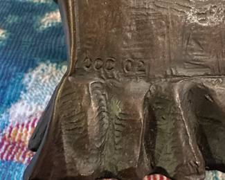 C128 - $75. Set of 3 Chocolate Resin Bookends by Manik. Dog has a tiny chip on the nose - no other issues noted.