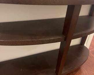 C128 - $75. Rounded Sofa Table or Entry Table. Measures 48" wide x 15" deep x 32" tall.