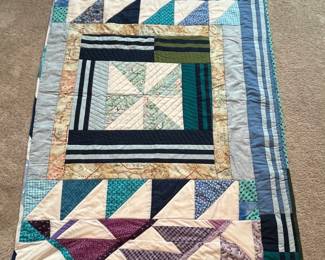 Q18 - $60. Like New Quilt. Measures 45" x 57.5" (lap / throw quilt)