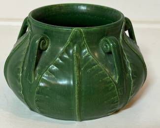 C38 - $150. Ephraim Pottery "Fiddlehead Vase" by Laura Klein. Measures 5" wide x 3" tall.