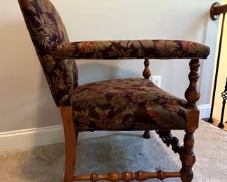 C86 - $250. Single Upholstered Arm Chair. Measures 25" wide x 17" deep x 33" tall. Sturdy with beautifully carved wood frame.