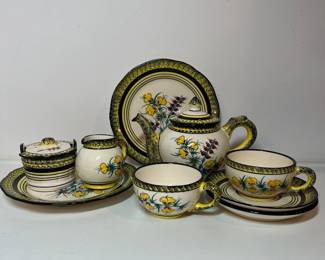 C31 - $200. "Broom & Heather" Quimper. 2 - Dessert Plates 8.5". 2 - Saucers 6". 2 Tea Cups - 5" x 2.25". 1 Cream & Sugar. 1 Tea Pot 8.5" x 5.5".