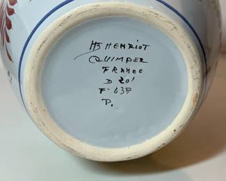 C15 - $50. Quimper Vase Breton Man on one side - floral design on the other. Signed "Henriot Quimper France D 201 F 637 P." Measures 5.75" x 8.5".