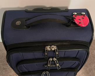 C98 - $40. Samsonite Rolling Luggage with spinner wheels. Measures 15" x 10" x 22.5" tall.