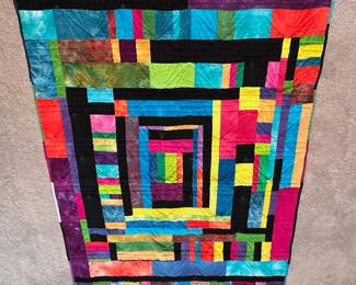 Q17 - $100. Like New Quilt. Measures 53.5" x 76" (Throw / Lap Size)