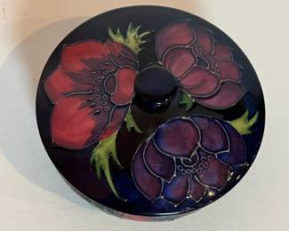 C9 - $125. Moorcroft Pottery, Cobalt Blue, Anemone Lidded Dish. Measures 5" wide x 3" tall.