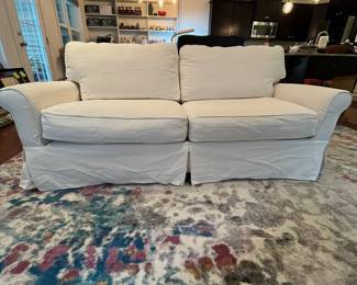 C55 - $1,200. Crate & Barrel Slip Covered Sofa. Measures 78.5" wide x 17.5" floor to seat x 30" deep. (Slipcover was just washed so excuse the wrinkles!) Includes an extra set of slip covers. Very comfortable and in very good condition. Non smoking home - No pets.