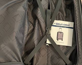 C97 - $350 PAIR. Sky Valet Hard Sided Luggage in very good condition! Includes the 22" *Smart* Carry On (wireless charger, USB Ports, Bluetooth TSA lock & removable battery pack) & Large 29" Luggage both with "shark" wheels.
