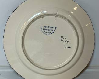 C33 - $40. Hen Riot Quimper "Portrait Plate". Measures 9 7/8"