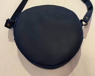 C69 - $50. Portland Leather Goods - Deep Water Blue Crossbody Purse. Measures 9" round + Strap.