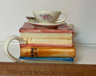 C43 - $30. Vintage Tony Carter Teapot with Stack of Books & Cup.