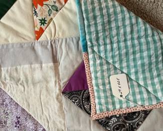 Q19 - $50. Like New Quilt. Measures 29" x 42.5" (lap / throw size)