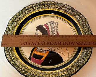 C33 - $40. Hen Riot Quimper "Portrait Plate". Measures 9 7/8"