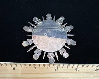 J41 - $400. Amethyst & Sterling Brooch or Pendant. Believed to be a William Spratling Design. Back is Stamped "Mexico Silver" qith a fancy M. Excellent vintage condition! Measures 3" across.