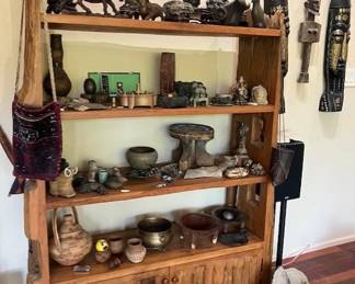 Many tribal items including Chinese art rocks with bases.