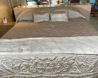 King Size Beautyrest Bed With Beige Moire Bedspread And Accent Pillows