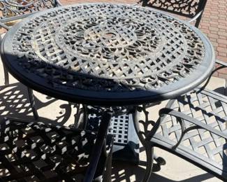 Heavy Iron Patio Table, Four Chairs, And Side Table