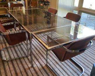 Available for presale
In the style of Milo Baughman.
8 chairs
$3500