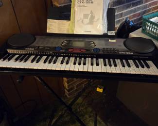 #32	Casio electronic keyboard with stand Model CTK-558	 $60.00
