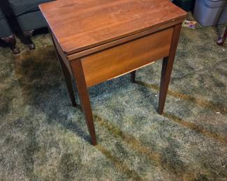 #36	Singer Fabric Mate sewing machine in cabinet and chair	 $30.00