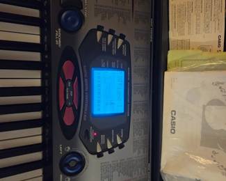 #32	Casio electronic keyboard with stand Model CTK-558	 $60.00