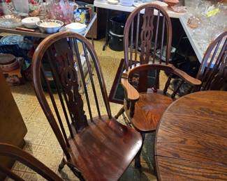 #60	Kitchen table wood with 1 leaf 2 captains chairs 4 regular chairs (as-is finish) 41" roundx 30" Leaf 20"	 $45.00
