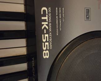 #32	Casio electronic keyboard with stand Model CTK-558	 $60.00