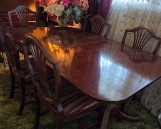 #46	Dining table wood with 6 chairs (as-is table leg needs repaired/finish) 83x42x29	 $65.00