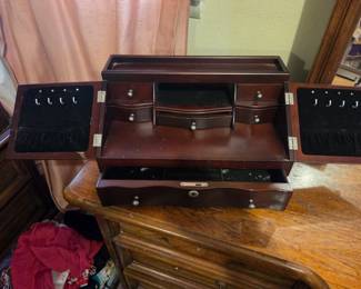 #51	Jewelry cabinet/ 6 drawer 2 door 17x10x9	 $20.00