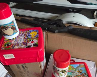 Two vintage lunchboxes with themoses