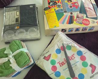 Scrapbook material
Twister game
Shower curtain with hooks
New washclothes
Lots and lots of other miscellaneous items