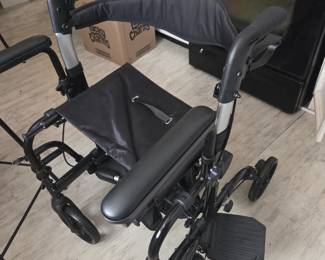 Walker/wheelchair combo...almost new