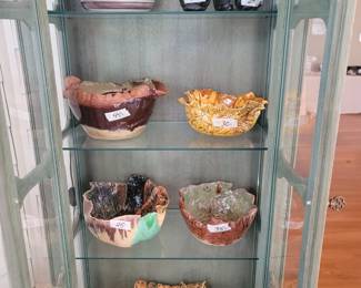Note: Cabinet is not for sale. Handmade Pottery