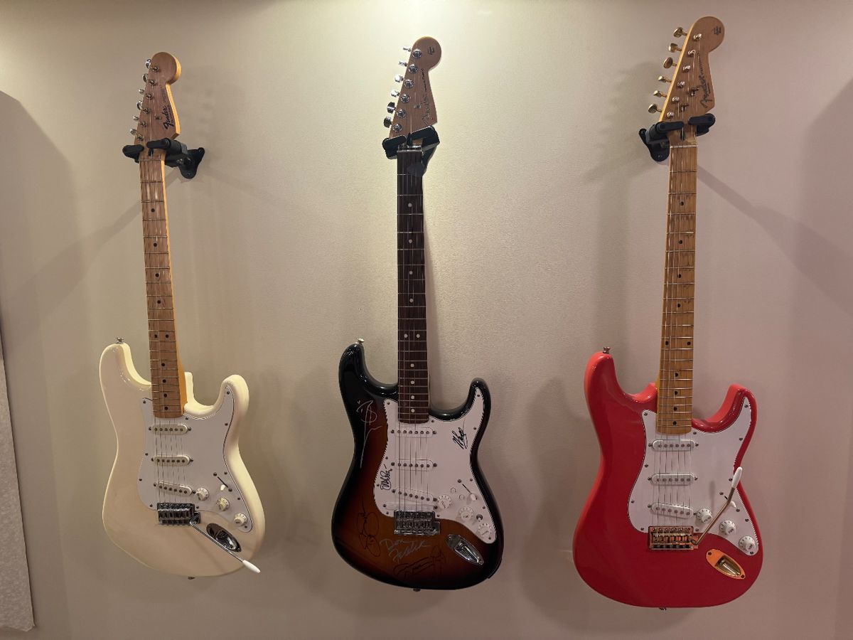 Fender Stratocaster Guitars. Center guitar is a 5G-BLK Stratocaster was autographed and has it's COA. Light up the Blues Concert, April 5, 2015 Signatures: David Crosby
Steven Stills
Graham Nash
Brandie Carlile
John Mayer
Don Felder (Eagles)