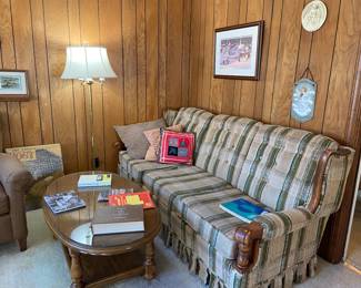American colony style plaid sofa and vintage coffee table