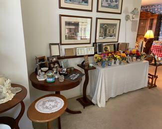 Lots of side tables and floral arrangements. Several signed & framed prints from Ohio artist William Breedon and a print from another local artist, Ed Gifford