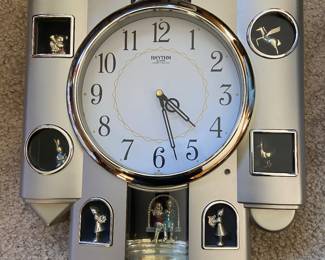 RHYTHM quartz hourly wall clock.