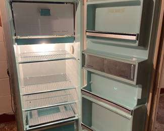 Vintage Kelvinator refrigerator - some rust issues along the bottom edge - but super cool interior.