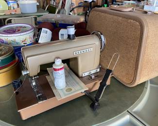 Vintage Kenmore sewing machine and lots of misc sewing notions