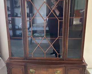 vintage mahogany china cabinet, also known as a hutch or breakfront