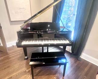 2000 Inaugural Selection K Kawai Baby Grand in Black Lacquer with Brass Casters $6000.00