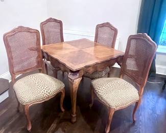 Solid Game Table with Inlay Top $499.00  Set of 4 Caned Back Burgére style chair with cheetah print upholstery $999.00