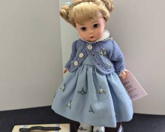 Several collectible dolls (Madame Alexander Running Away to Grandma's)