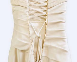 Back view of Maggie Sottero satin A-line Size 4 wedding dress