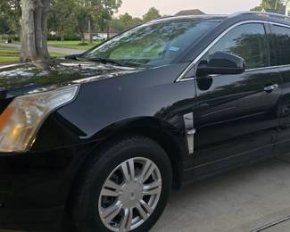 2012 Cadillac. Runs Great. Very Clean - Garage kept!