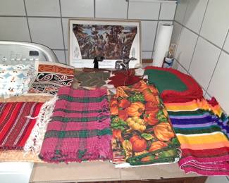 Variety of holiday tablecloth and  placemats