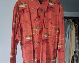 Several fish design printed shirts and clothing