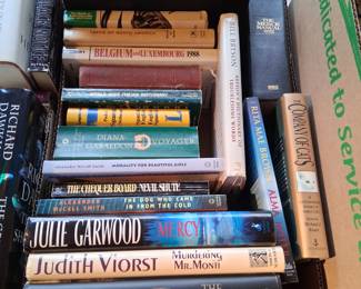 titles and authors include: 
The Collectors by David Baldacci
Murdering Mr. Mont by Judith Viorst
Mercy by Julie Garwood
The Dog Who Came In From the Cold by Alexander McCall Smith
Morality for Beautiful Girls by Alexander McCall Smith
The Chequer Board by Nevil Shute
Company of Cats, edited by Michael Rosen